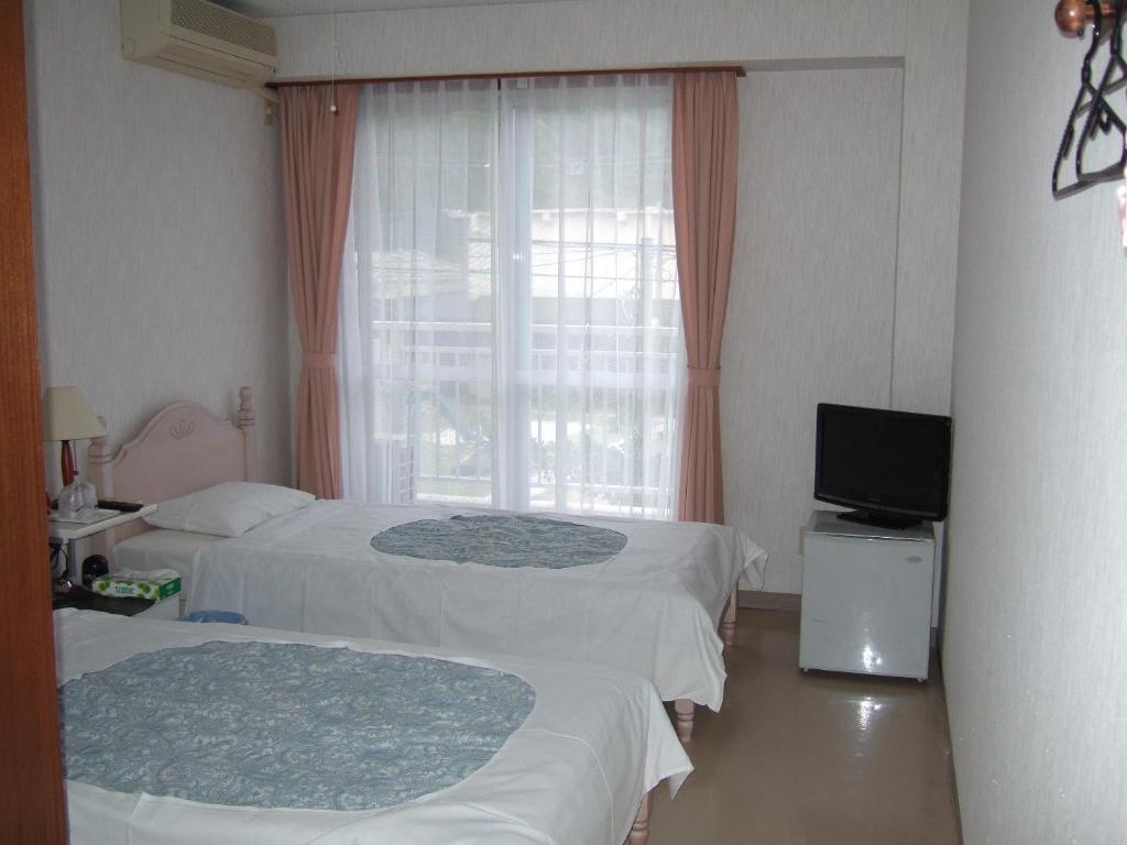 Pension Takatsuki Zamami Habitación foto